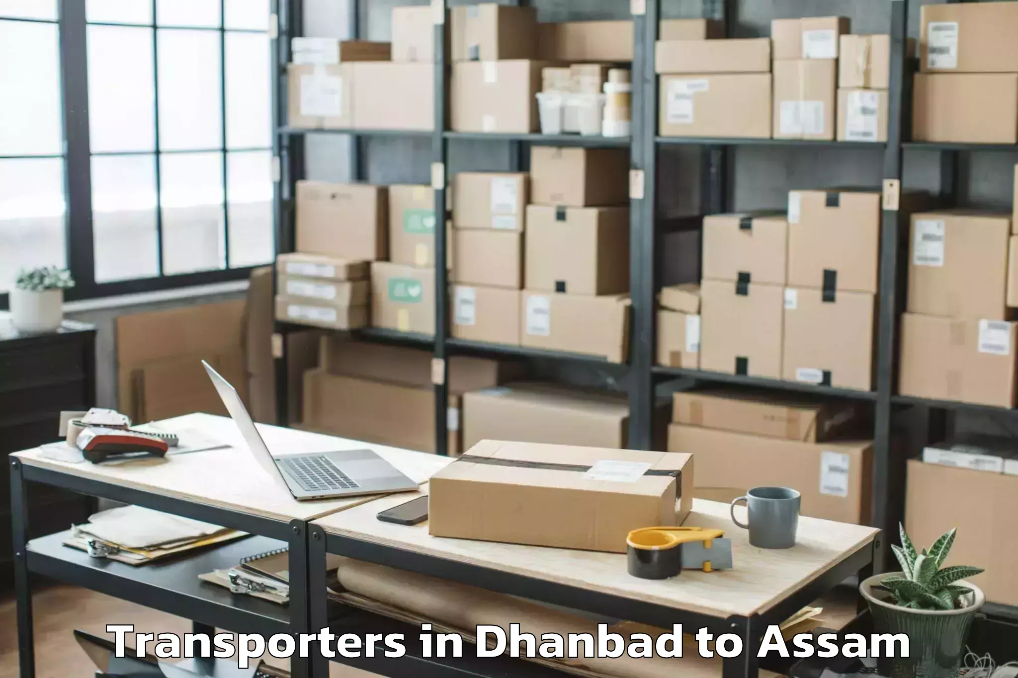 Book Dhanbad to Bongaigaon Pt Transporters Online